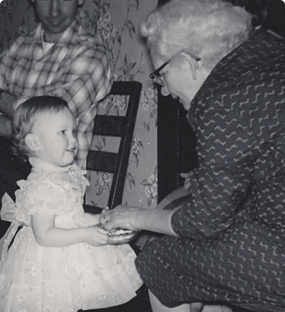 Grandmother greeting granddaugher